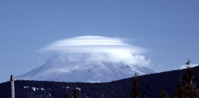 Lenticular cloud.  Mt. St. Helens obscured by a lenticular cloud formation,  April 3, 1980, prior to the May eruption.