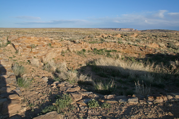 Kiva depression in Pueblo Alto with late afternoon shadows.